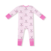 Pink baby onesie with hockey pattern on a white background