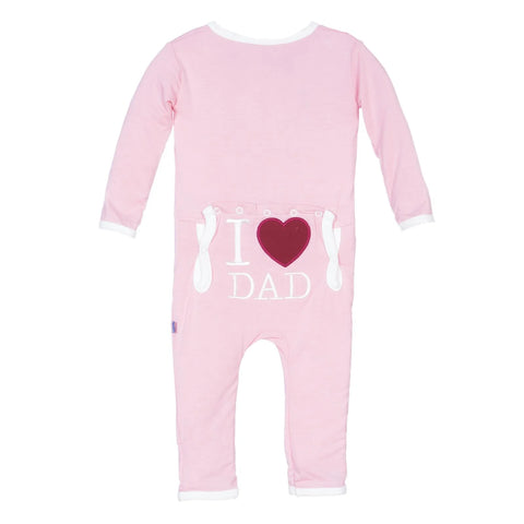 pink coverall with I heart dad embroidered on bum