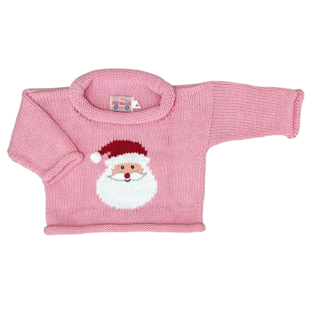 Pink knitted sweater with Santa Claus face design on a white background