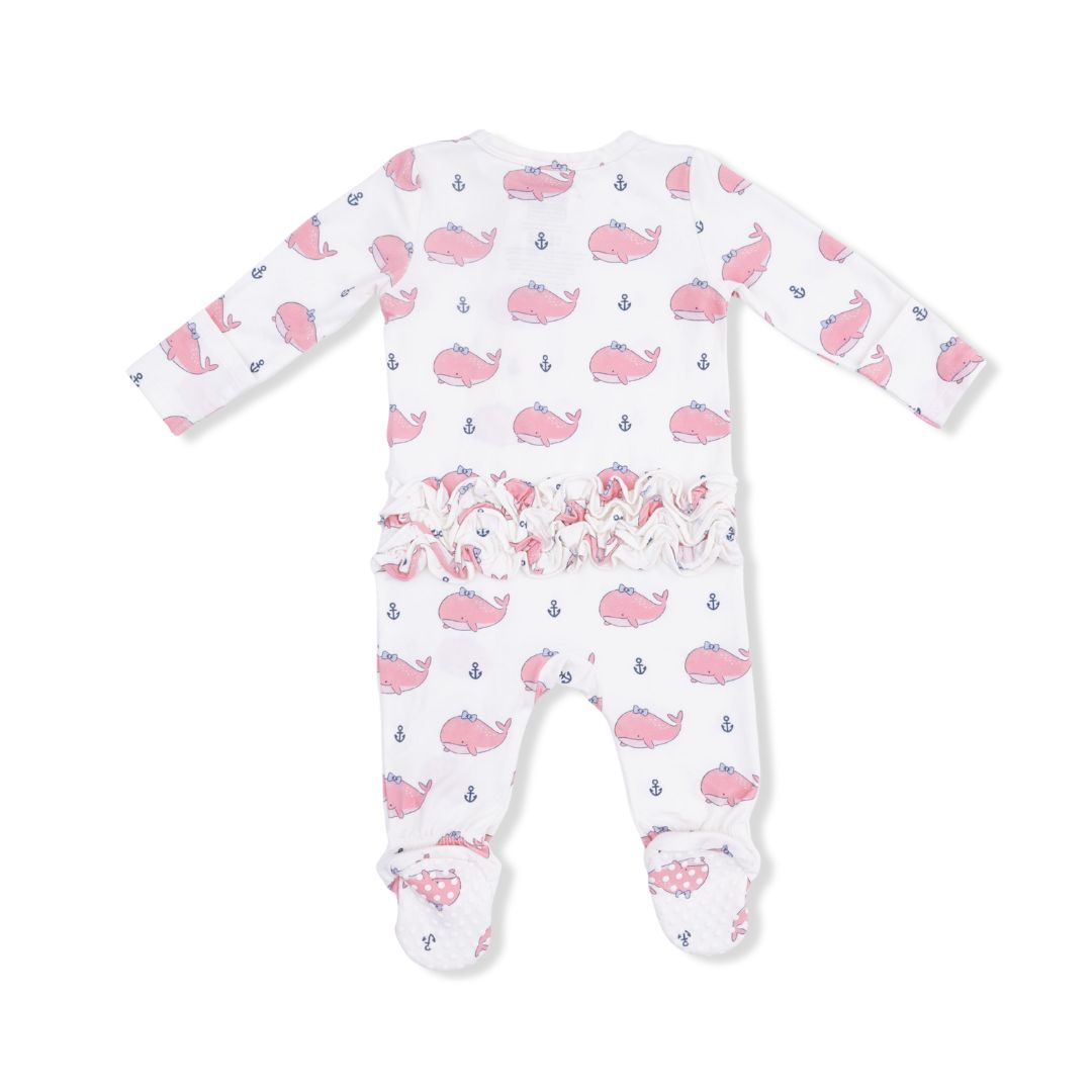 Baby onesie with pink whale pattern on a white background