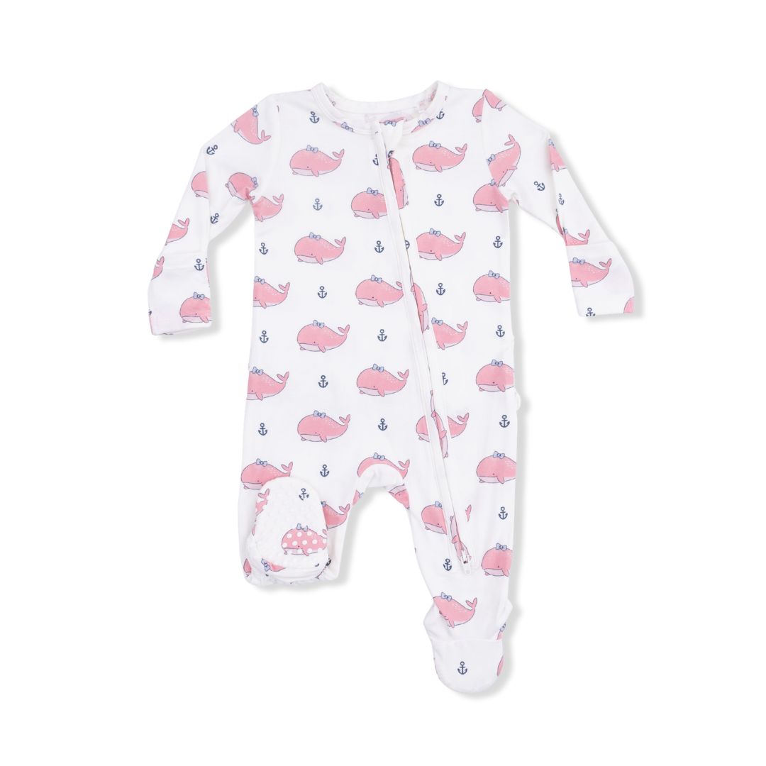 Baby onesie with pink whale pattern on a white background