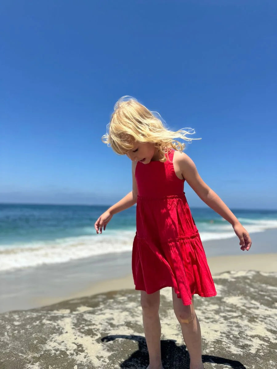 girl wearing dress on beach