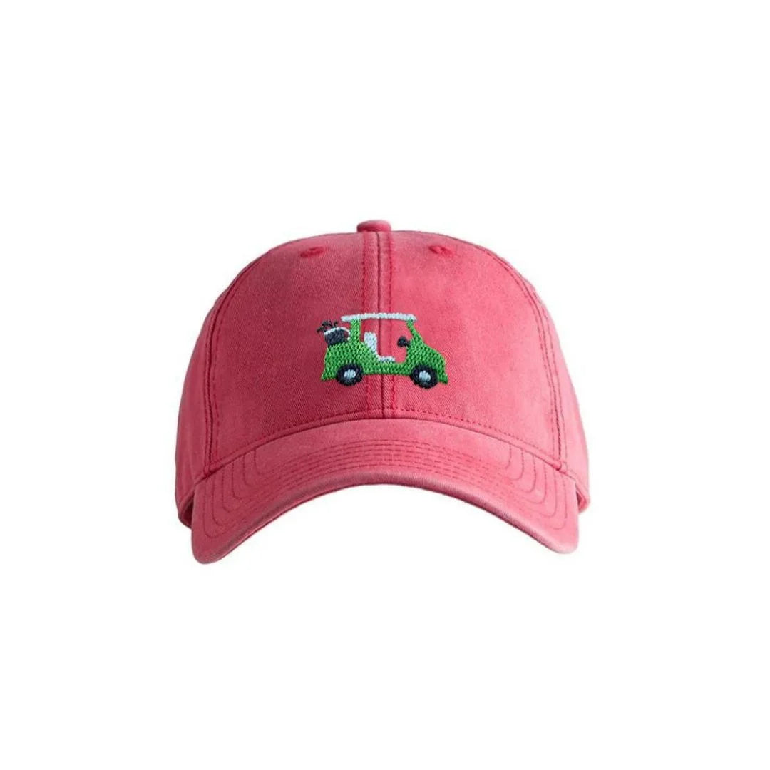 red baseball hat with green golf cart