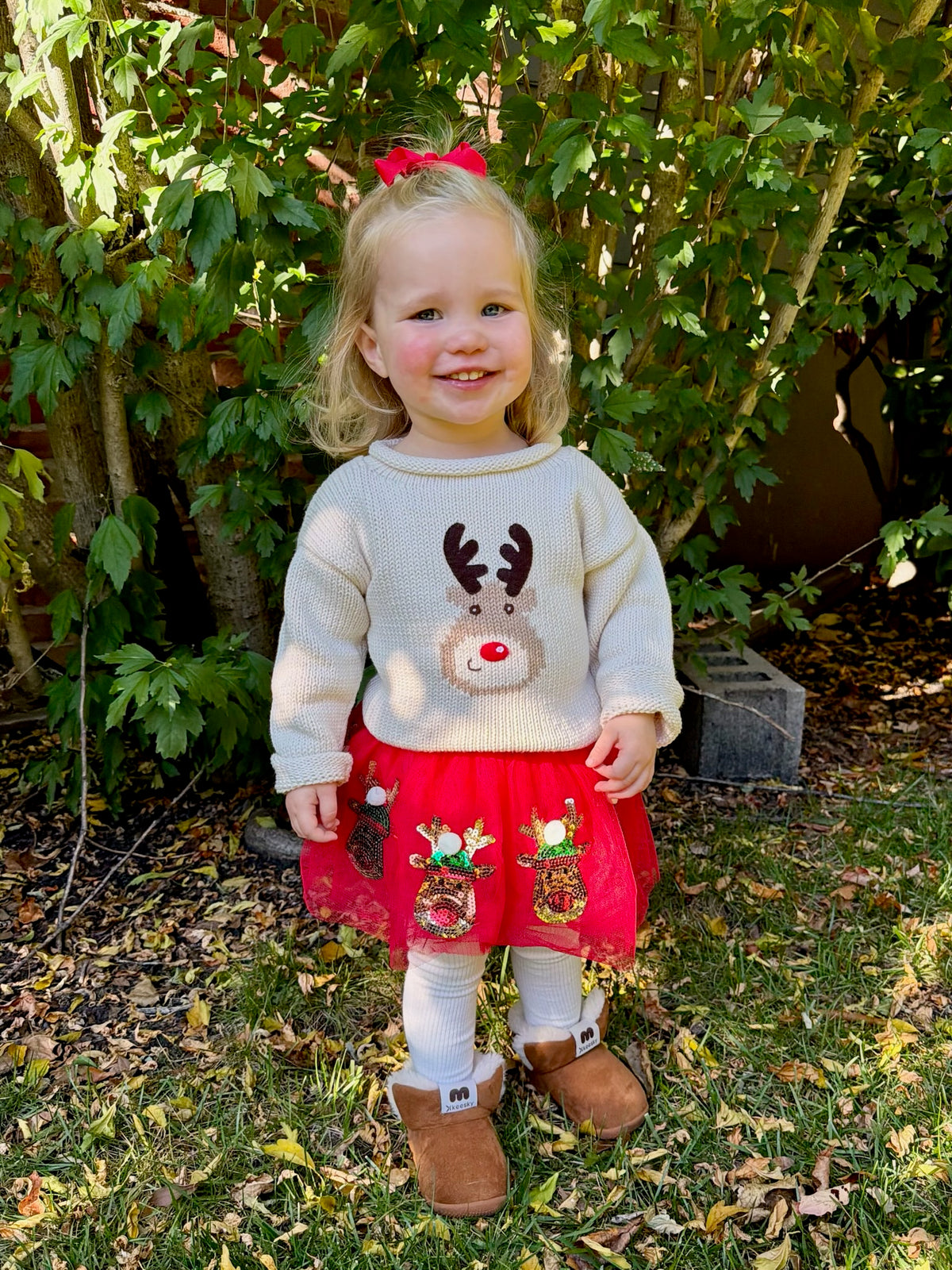 ivory rudolph sweater and tutu