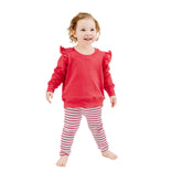 red sweatshirt and red striped leggings