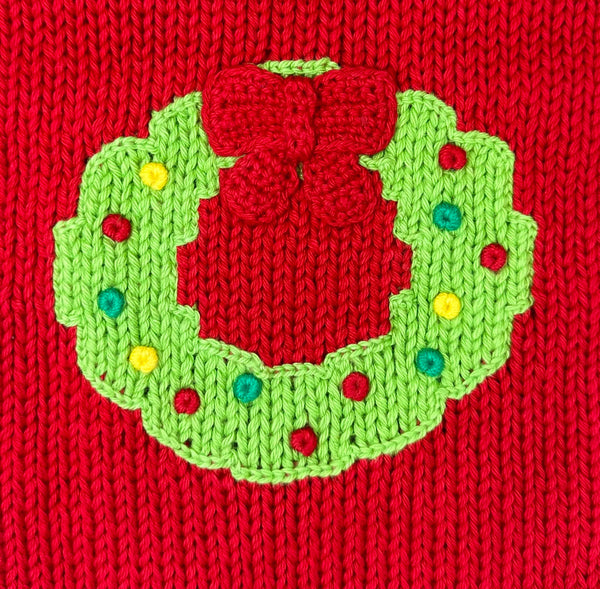 christmas wreath - green with red, green, and light dots and red bow at top