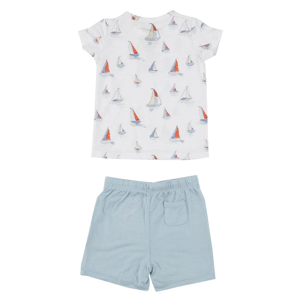 sailboat shirt and blue shorts