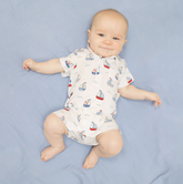baby wearing sailboat romper