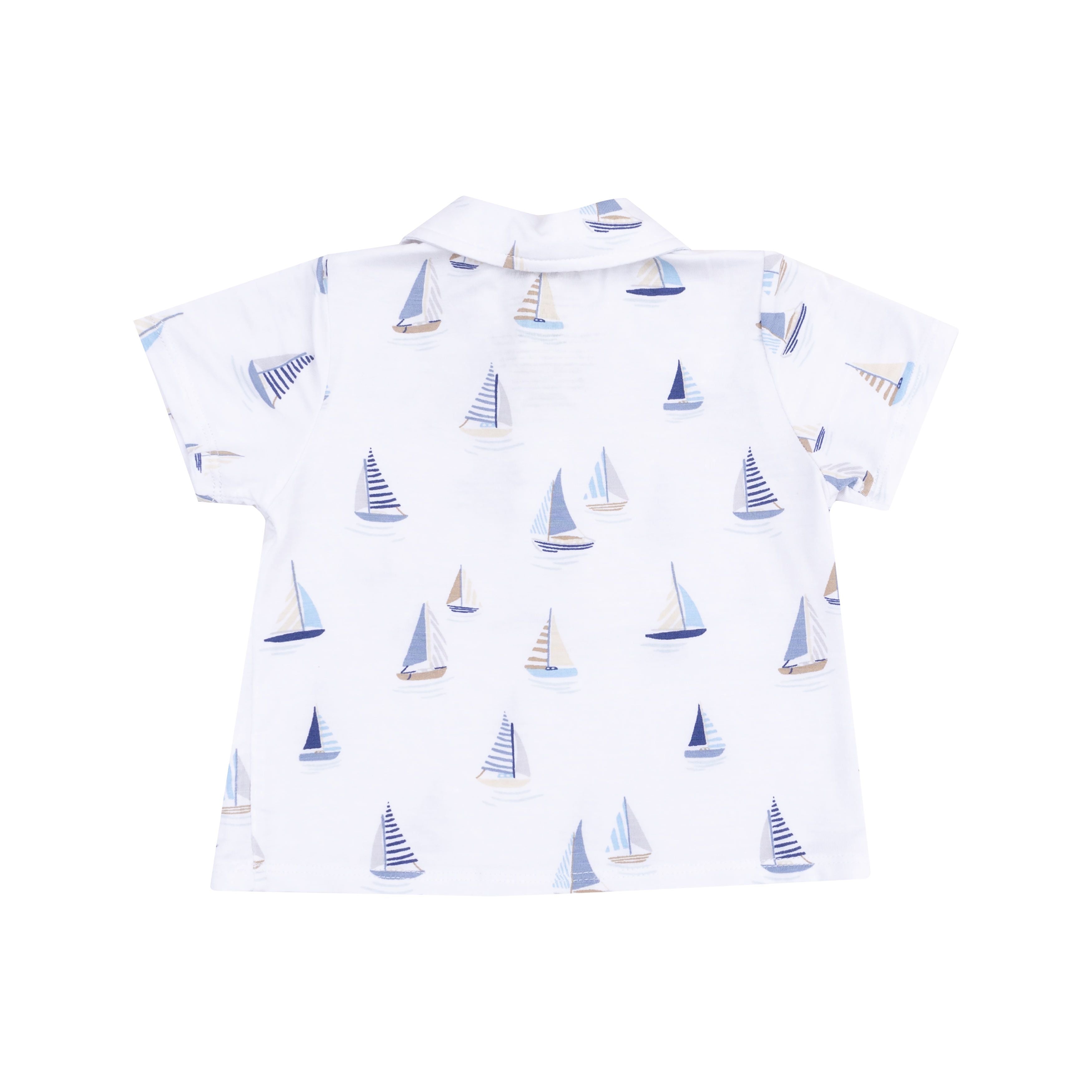 white shirt with sailboats on it