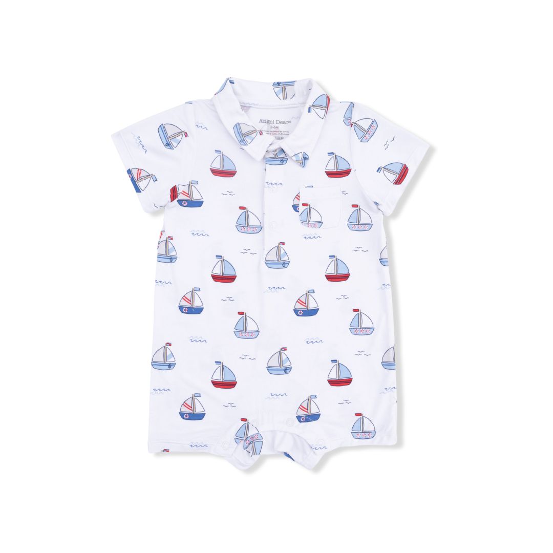 Baby romper with sailboat pattern on a white background