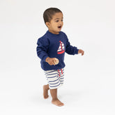 sailboat sweatshirt and striped shorts