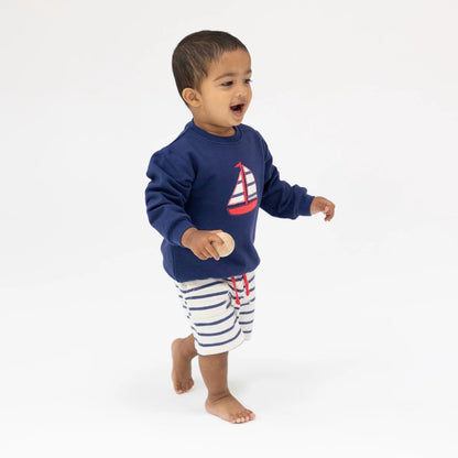 sailboat sweatshirt and striped shorts