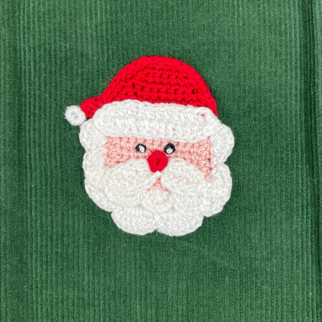 close up of knit santas