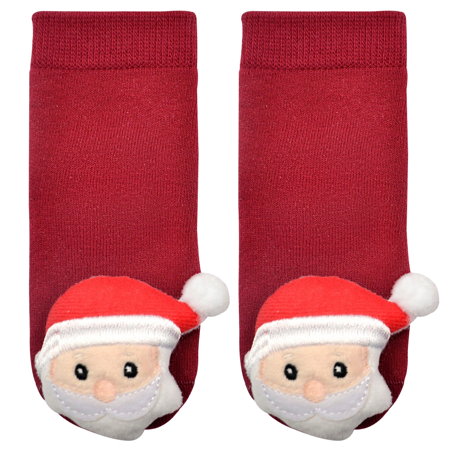 red socks with stuffed Santa heads on toes