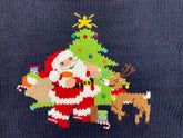 santa_in_front_of_Christmas_tree_with_sack_of_toys_and_reindeer