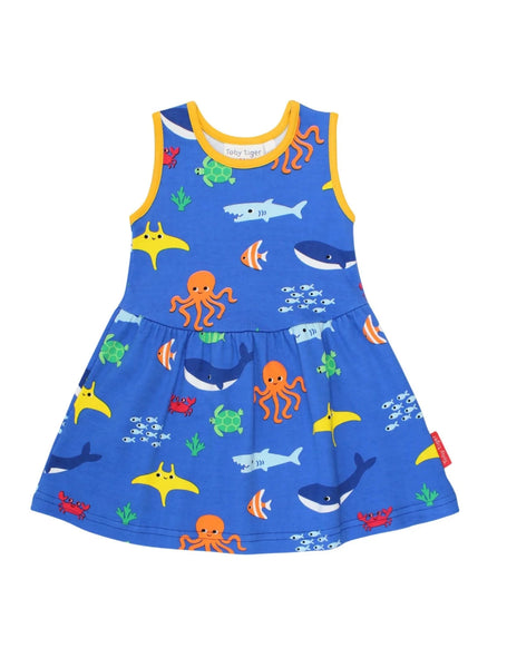 blue sleeveless dress with multi color sea animals all over with yellow trim on neckline and armholes