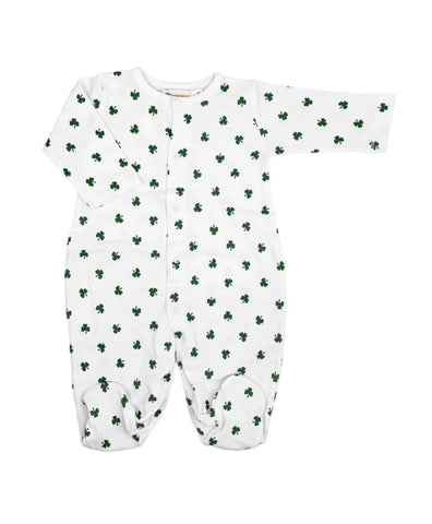 white snap footie with green shamrocks all over