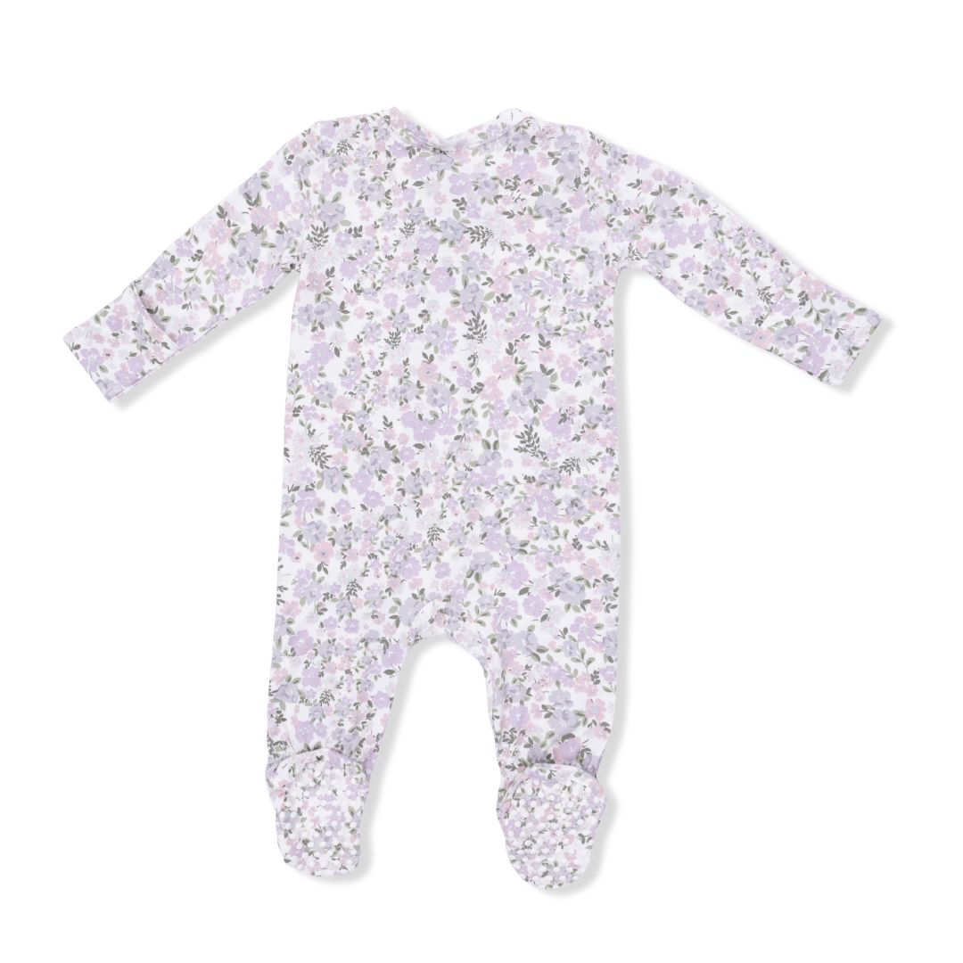 Floral patterned baby onesie on a white background