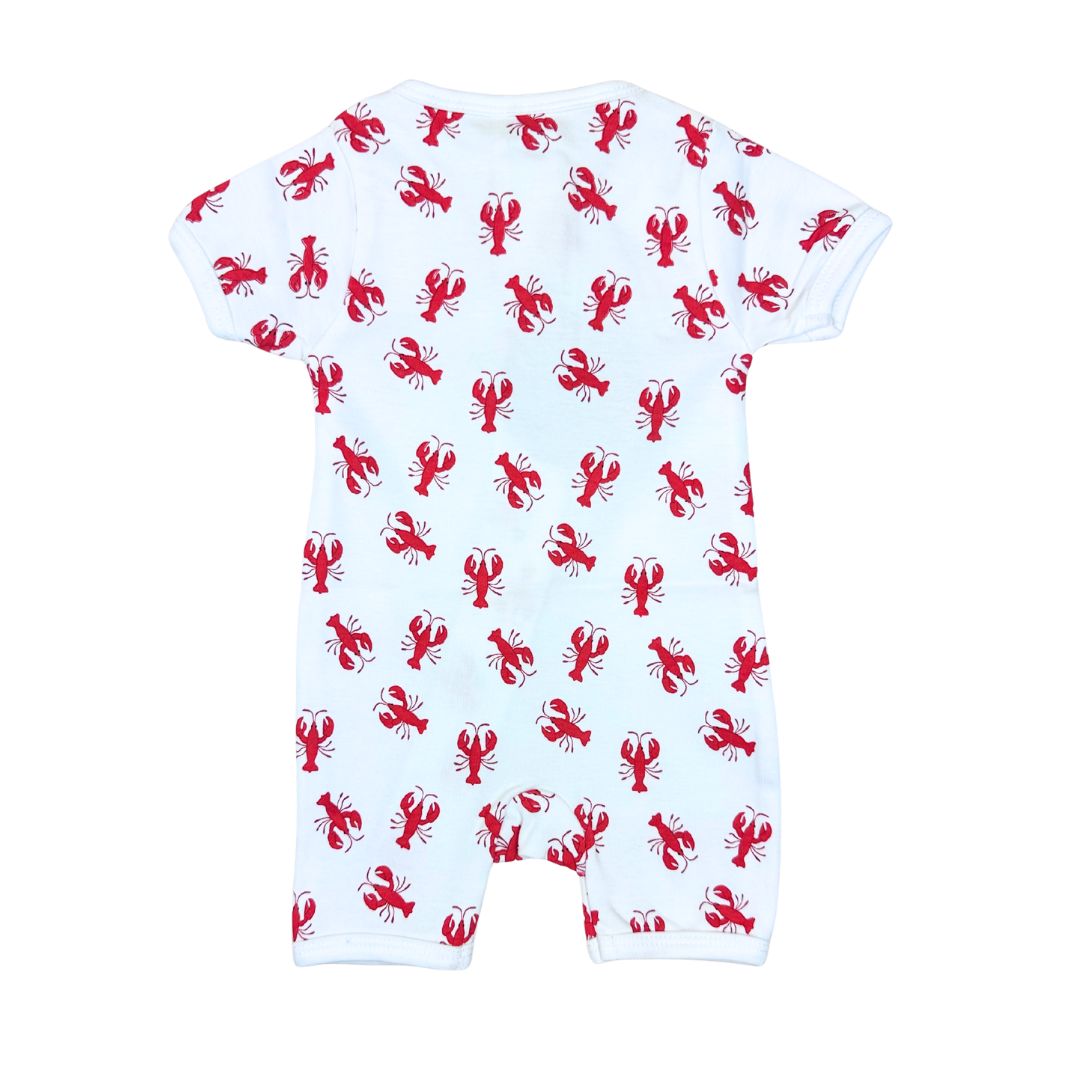 White baby romper with red lobster pattern on a white background