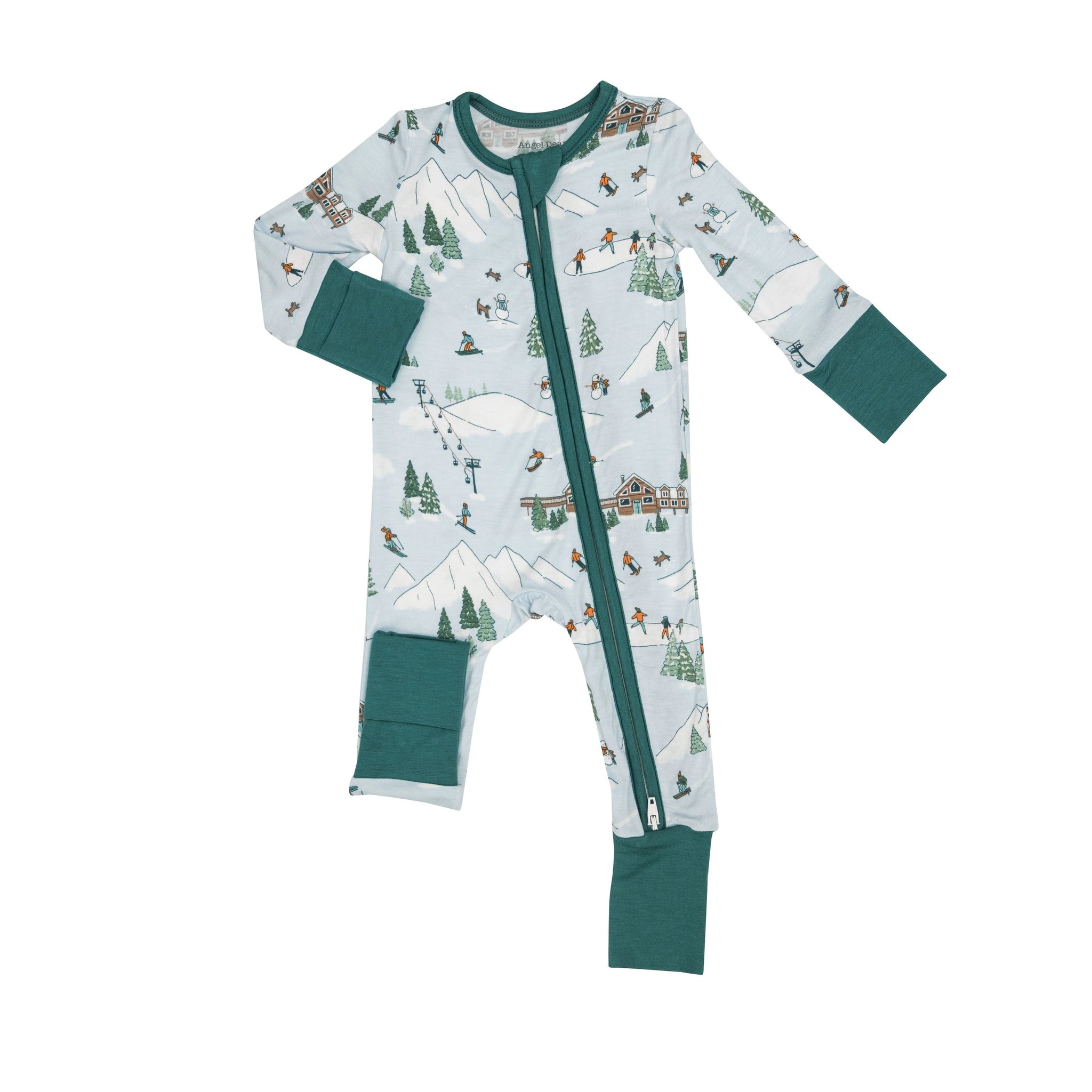 blue romper with ski lodge and skiing print all over