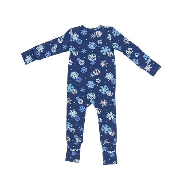 dark blue romper with snowflakes all over