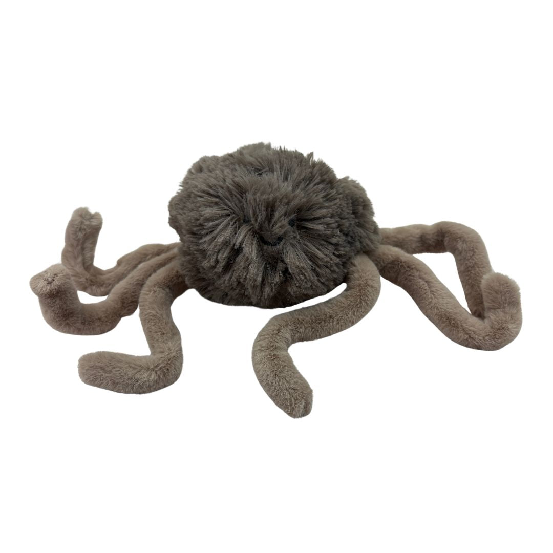 Plush spider toy on a white background