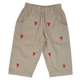Beige pants with red lobster embroidery on a tan background