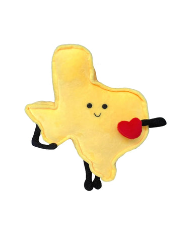 yellow state shaped texas plush with arms and legs and is holding heart