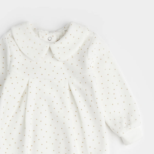 white velour peter pan collar footie with golden dots all over