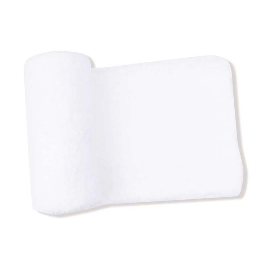 A white, plush rolled-up blanket on a clean white background.