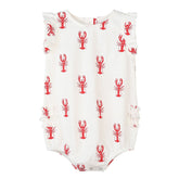 White baby romper with red lobster pattern on a white background