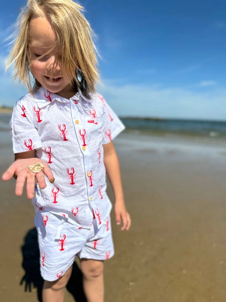 boy wearing lobster button down shirt