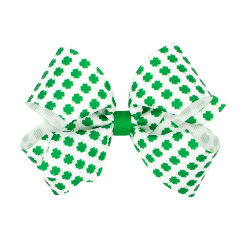 white bow with green shamrocks all over