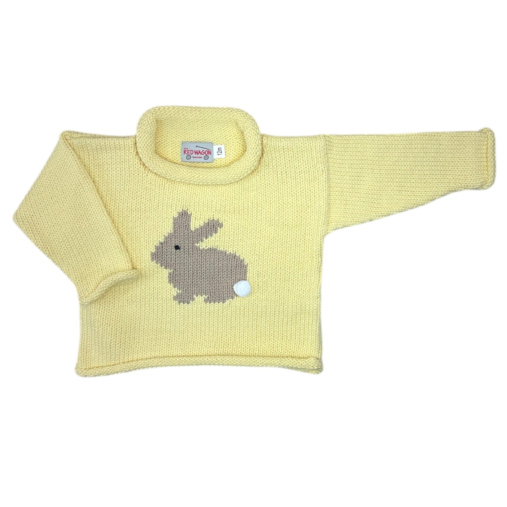 Yellow baby sweater with a bunny design on a white background