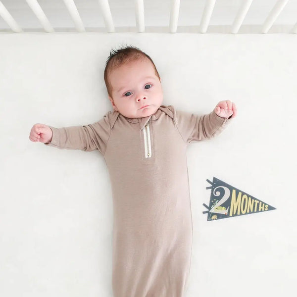 baby with 2 months pennant