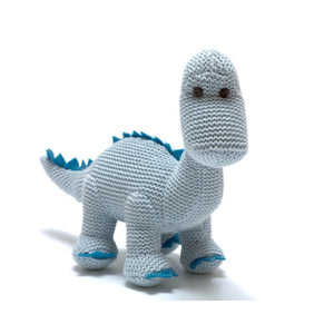 light blue knitted dinosaur plush rattle with darker blue mane and blue details on each foot