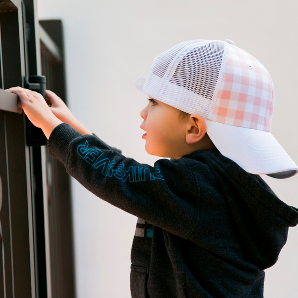 little kid wearing hat