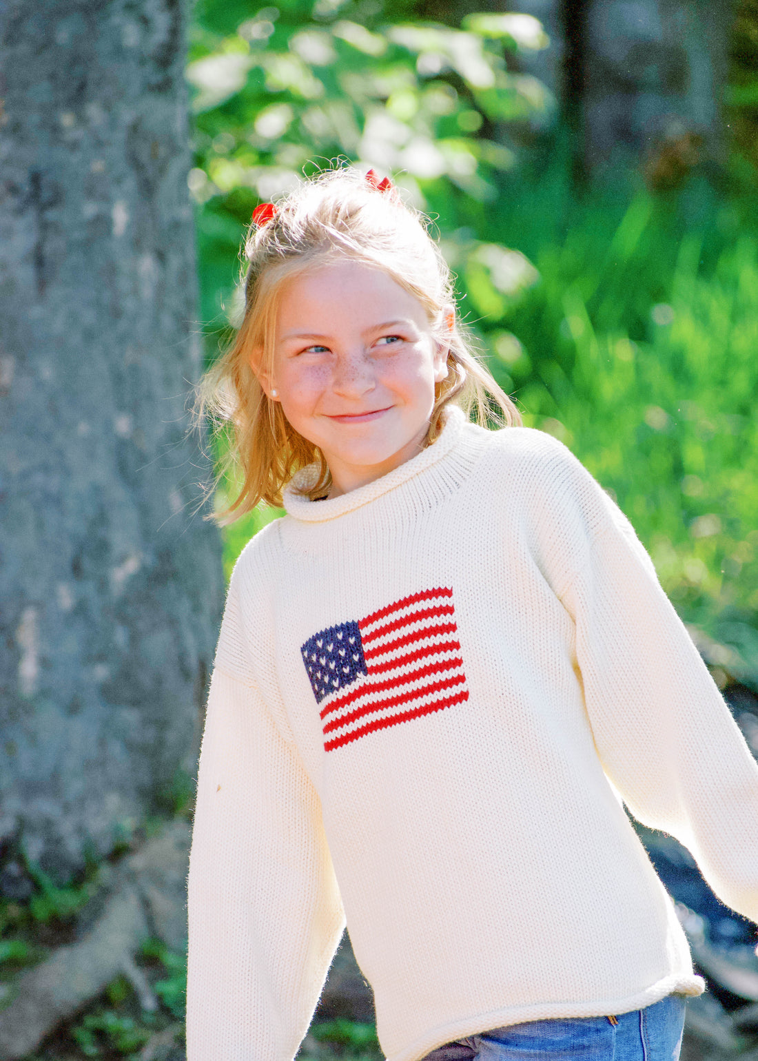 little girl wearing sweater