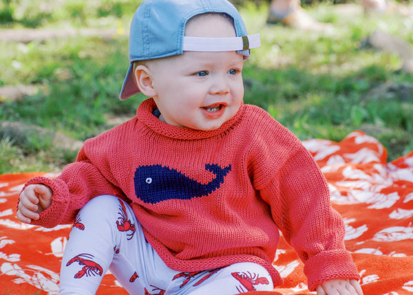 baby wearing nantucket red whale sweater