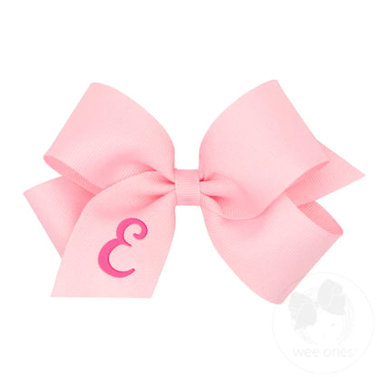 pink bow with letter E