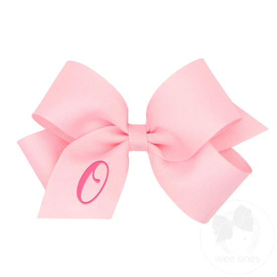 pink bow with letter O