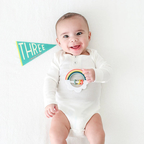 baby with three month pennant