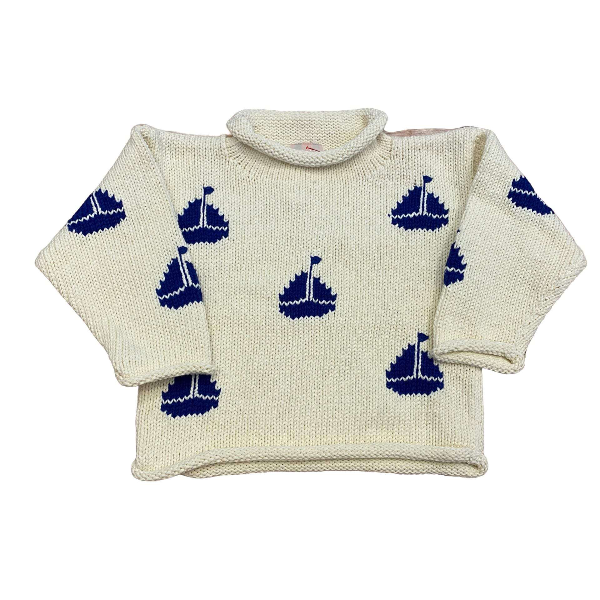 ivory roll neck sweater with dark blue sailboats knitted all over