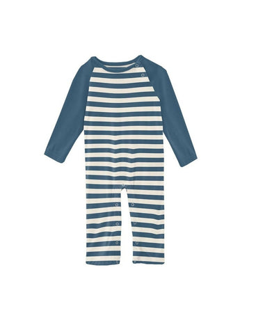 navy and white striped romper with navy long sleeves and snap closures