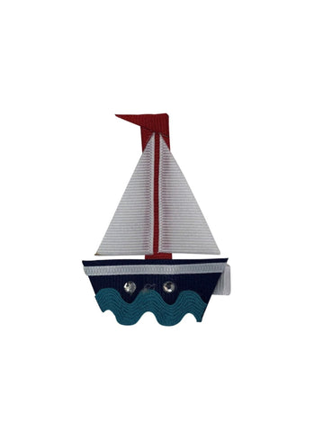 white and navy sailboat with red detail and rhinestone details