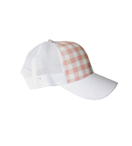 side view of pink buffalo plaid trucker hat