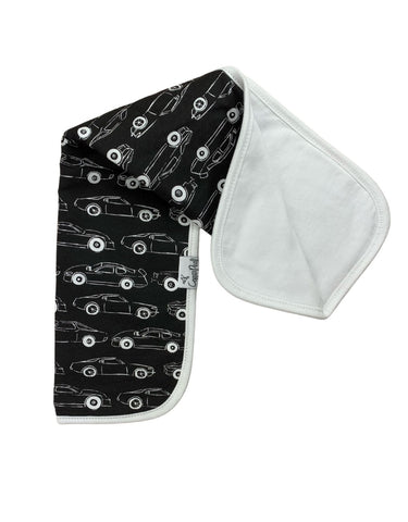 black burp cloth with white outlines of cars