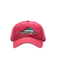 weathered red hat with wagoneer and christmas tree