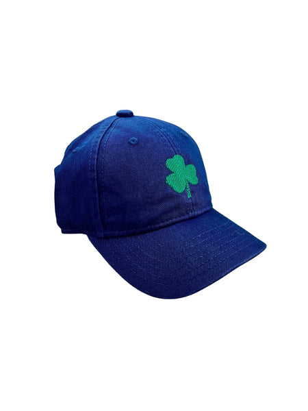 navy baseball hat with green shamrock