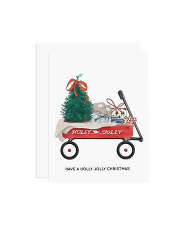Greeting card that shows a wagon filled with toys and says Have a Holly Jolly Christmas